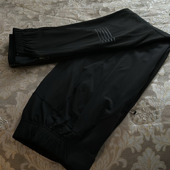 Men’s Salomon Wind Shield pants, size medium, zippered bottom cuffs. - Picture 8 of 9